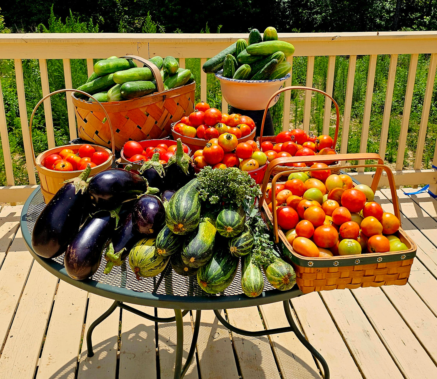 Assorted fruits and vegetables on a table outdoors